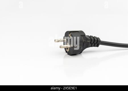 Black electric computer power supply cable isolated on a white background Stock Photo