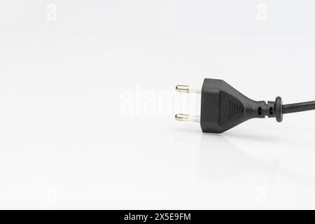 Black 2-pin electric plug isolated on white background Stock Photo