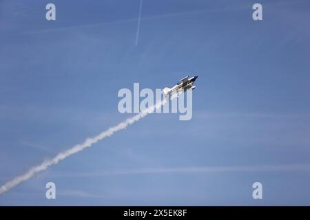 Ballenstedt, Germany. 09th May, 2024. A small airplane flies over Ballenstedt airfield. The airfield hosted an open day on Ascension Day. Thousands of visitors experienced flight demonstrations and parachute jumps by participating pilots throughout the day. Credit: Matthias Bein/dpa/ZB/dpa/Alamy Live News Stock Photo