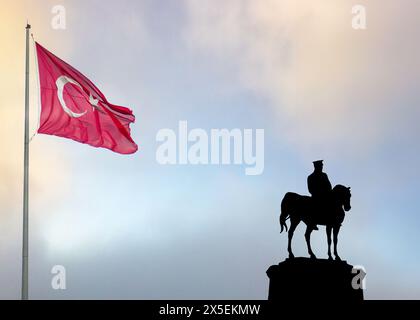 Ataturk's statue, symbolizing victory, freedom, and democracy in Turkey. with Turkish flag . Erzurum,Turkey - 30 August 2023.  Stock Photo