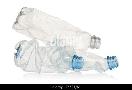 Crumpled disposable plastic bottles isolated on white Stock Photo - Alamy