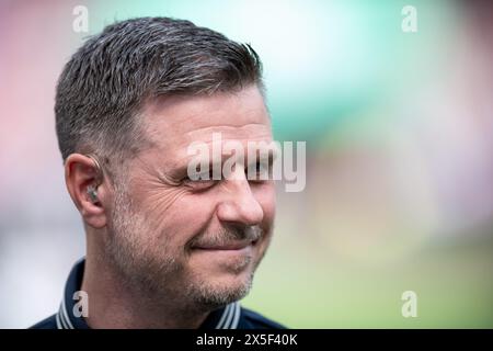 Cologne, Germany. 09th May, 2024. Soccer, Women: DFB Cup, VfL Wolfsburg - Bayern Munich, final, RheinEnergieStadion. Bayern's coach Alexander Straus. Credit: Fabian Strauch/dpa - IMPORTANT NOTE: In accordance with the regulations of the DFL German Football League and the DFB German Football Association, it is prohibited to utilize or have utilized photographs taken in the stadium and/or of the match in the form of sequential images and/or video-like photo series./dpa/Alamy Live News Stock Photo