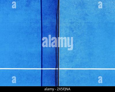 blue paddle tennis court, directly above partial aerial drone view Stock Photo