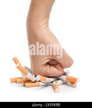 Stop smoking. Man crushing cigarettes on white background, closeup Stock Photo