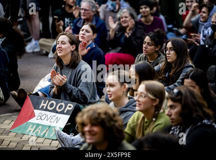 UTRECHT - Protesters have gathered on Domplein, a day after a group of demonstrators entered a building of Utrecht University (UU). The demonstrators want the university to cut all ties with Israel. ANP SEM VAN DER WAL netherlands out - belgium out Stock Photo