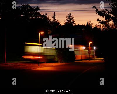 Night shot of a moving tram in Passauerstraße Stock Photo