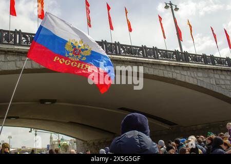 Moscow, Russia. 09th May, 2024. Russian flag is seen as people celebrate the Victory Day. The Victory Day is celebrated annually on May 9. Besides its symbolic meaning, it has been a tool to demonstrate Russia's new weaponry to potential adversaries. Credit: SOPA Images Limited/Alamy Live News Stock Photo