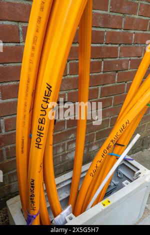 Distribution box in which empty conduits for fiber optic cables arrive and are connected, in which the actual fiber optic cable is later blown in and Stock Photo