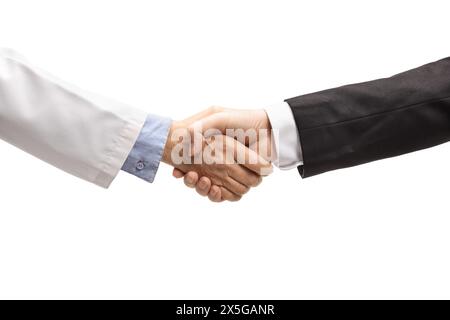Female doctor and a businessman shaking hands isolated on white background Stock Photo