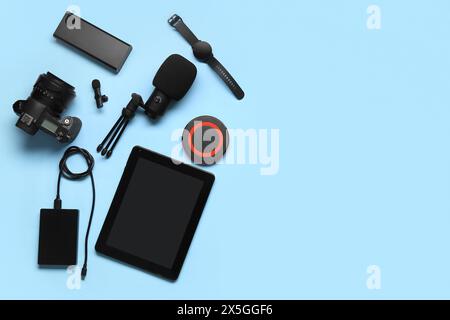Composition with different devices on color background Stock Photo