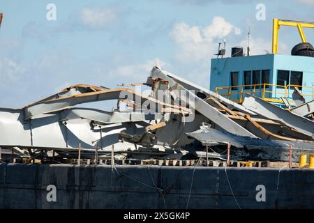 Dundalk, United States of America. 01 May, 2024. Debris from the wreckage of the collapsed Francis Scott Key Bridge is piled on barges for removal, May 1, 2024, near Dundalk, Maryland. The bridge was struck by the 984-foot container ship MV Dali on March 26th and collapsed killing six workers.  Credit: Christopher Rosario/U.S Army Corps of Engineers/Alamy Live News Stock Photo