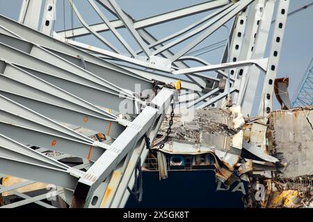 Dundalk, United States of America. 07 May, 2024. Piles of steel truss and debris from bridge section four, lay across the bow of the cargo ship M/V Dali from the collapsed Francis Scott Key Bridge, May 7, 2024, near Dundalk, Maryland. The bridge was struck by the 984-foot container ship MV Dali on March 26th and collapsed killing six workers.  Credit: Christopher Rosario/U.S Army Corps/Alamy Live News Stock Photo