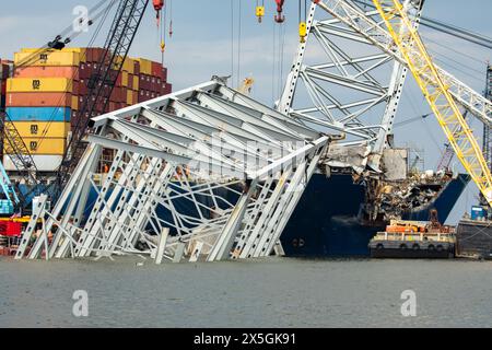 Dundalk, United States of America. 07 May, 2024. Piles of steel truss and debris from bridge section four, lay across the bow of the cargo ship M/V Dali from the collapsed Francis Scott Key Bridge, May 7, 2024, near Dundalk, Maryland. The bridge was struck by the 984-foot container ship MV Dali on March 26th and collapsed killing six workers.  Credit: Christopher Rosario/U.S Army Corps/Alamy Live News Stock Photo