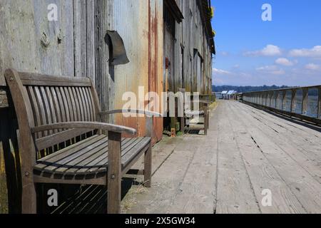 Old fishery building sidewalk Stock Photo