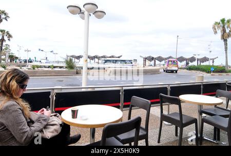 Moring coffee at the Aroma espresso bar at the  Opera tower in Tel-Aviv, Israel. Stock Photo