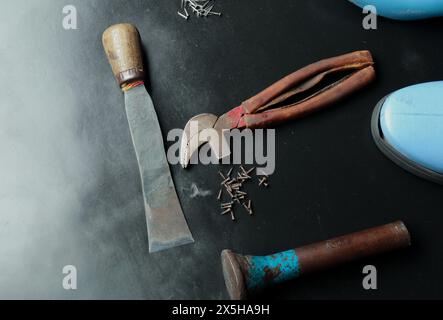 cobller tools isolated on the working table Stock Photo