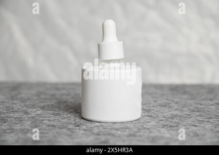 Daily, beauty care cosmetic. scin care .serum . on gray background. scin care concept Stock Photo
