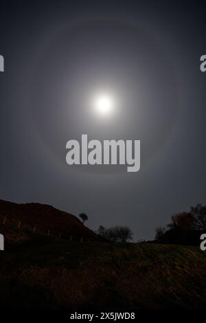 Nightime image of the Moon with a Lunar Halo, Oban, Scotland, UK. Stock Photo