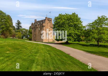 Crathes Castle, a classic Scottish tower house in Aberdeenshire, Scotland, boasts charming turrets and beautiful gardens. Stock Photo