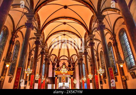 St. Joseph's Cathedral, Beijing, China. Famous catholic church built in 1655 and in Chinese character signs are Christian sayings in Chinese Stock Photo