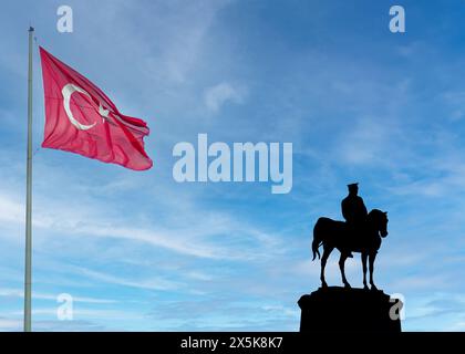 Ataturk's statue, symbolizing victory, freedom, and democracy in Turkey. with Turkish flag . Erzurum,Turkey - 30 August 2023.  Stock Photo