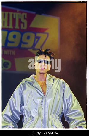 PETER ANDRE, YOUNG, 1997: A young Peter Andre on the 1997 Smash Hits Tour at Cardiff International Arena CIA, Cardiff, Wales, UK on 22 November 1997.  Photo: Rob Watkins. INFO:  Peter Andre, born on February 27, 1973, in Harrow, London, is a British-Australian singer, songwriter, and television personality. Rising to fame in the '90s, he has enjoyed success in music, reality television, and philanthropy. Stock Photo