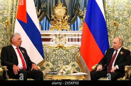 Moscow, Russia. 09th May, 2024. Russian President Vladimir Putin listens to Cuban President Miguel Díaz-Canel, left, during a bilateral meeting at the Grand Kremlin Palace, May 9, 2024 in Moscow, Russia. Credit: Mikhail Metzel/Kremlin Pool/Alamy Live News Stock Photo