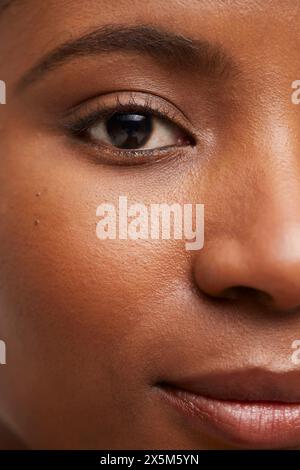 Close-up of smiling womans face Stock Photo
