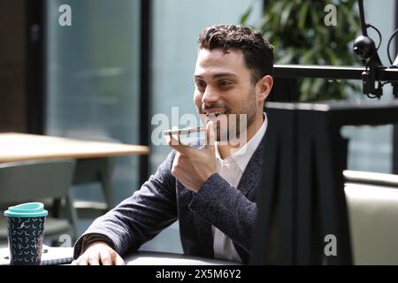 Smiling businessman talking on phone Stock Photo