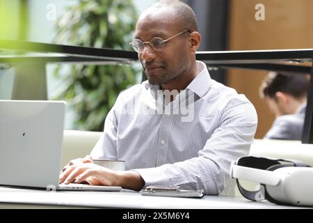 Businessman working on laptop Stock Photo