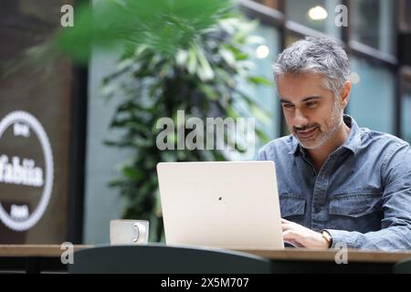 Businessman working on laptop Stock Photo