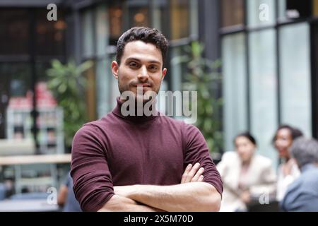 Portrait of young businessman in office Stock Photo