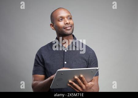 Businessman using digital tablet Stock Photo