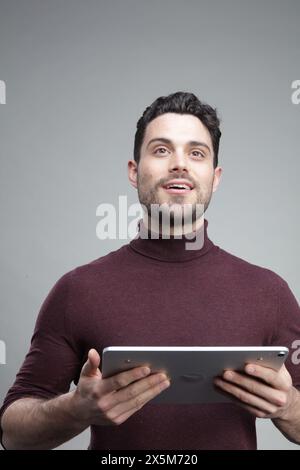 Young businessman using digital tablet Stock Photo