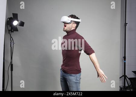 Young man using virtual reality headset Stock Photo