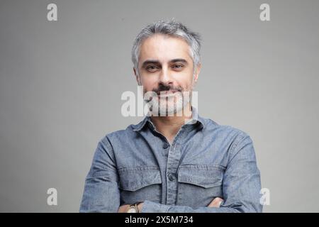 Portrait of smiling mature man Stock Photo