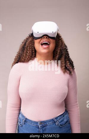 Woman wearing virtual reality headset Stock Photo