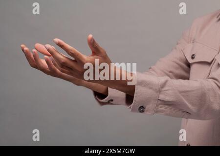 Close-up of male hands making gesture Stock Photo
