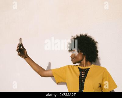 Young woman taking selfie Stock Photo