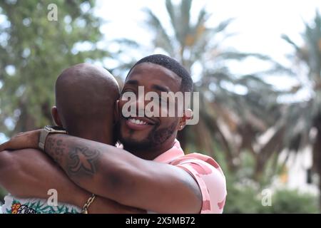 USA, Louisiana, Smiling gay couple embracing outdoors Stock Photo