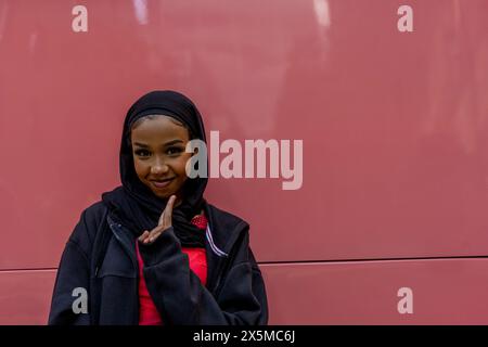 Portrait of smiling young woman wearing hijab Stock Photo