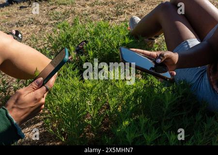 Young women using smart phones Stock Photo