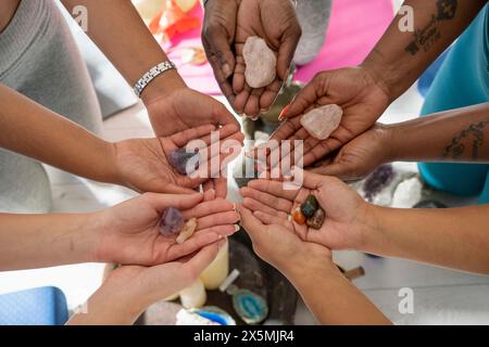 Close-up of women''s hands holding crystals Stock Photo