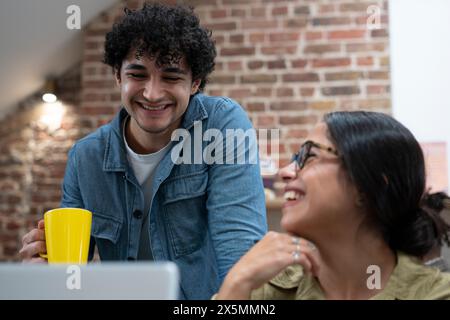 Creative professionals working in office Stock Photo