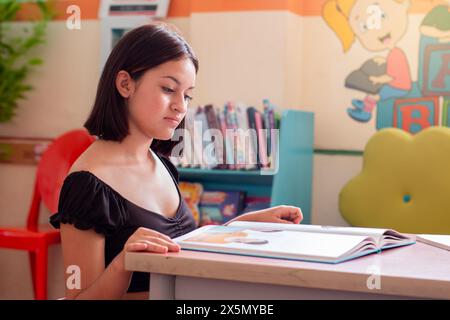 lifestyle: teenager doing his school homework Stock Photo