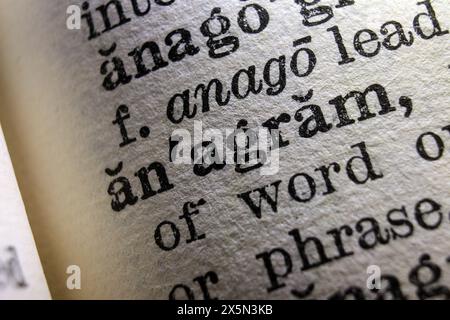 Word anagram on dictionary page, macro close-up Stock Photo