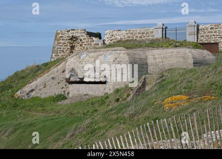 Saint-Malo, France - Apr 11, 2024: Stp. Ra109 Pointe de la Varde forms the North-Eastern defensive corner of the site of St Malo. Atlantic Wall. Sunny Stock Photo