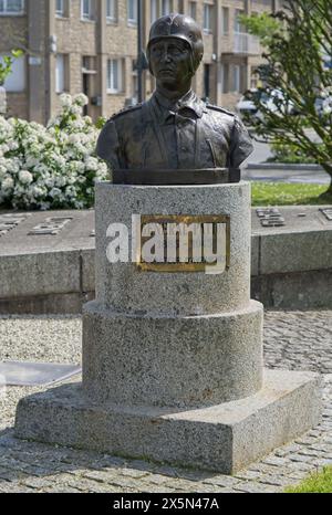 Avranches, France - Apr 13, 2024: General Patton square, Avranches. Monument and Sherman Thunderbolt tank. Sunny spring day. Selective focus Stock Photo