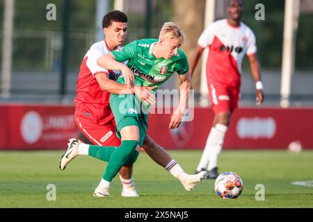 Utrecht, Netherlands. 10th May, 2024. UTRECHT, 10-05-2024, Zoudenbalch, Keuken Kampioen Divisie, Dutch football, season 2023/2024, during the match Jong Utrecht - Dordrecht, Jong FC Utrecht player Rafik El Arguioui, FC Dordrecht player Rocco Robert Shein Credit: Pro Shots/Alamy Live News Stock Photo