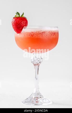 Strawberry fields cocktail garnished with balsamic vinegar drops Stock Photo
